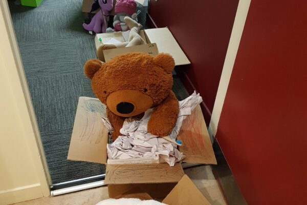 Lining up to brush their teeth.