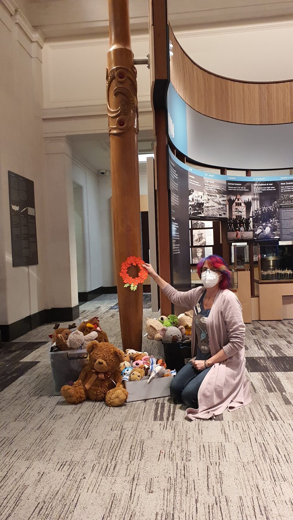 Anne and the soft toy sleepover toys laying our wreath at Pou hi Te Whatu-ā-mahara, Auckland War Memorial Museum.